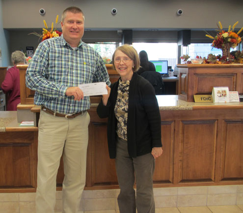 malinda allison fannin receives donation bank mark st